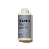 Flacone di Olaplex N°.4CURL Bond Shaper Hydrating Curl Shampoo da 250 ml su sfondo bianco